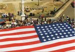 A view of the American Flag in front of the Lafayette County Courthouse, image 003 by Author Unknown
