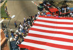 A view of the American Flag in front of the Lafayette County Courthouse, image 005 by Author Unknown