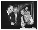 Eudora Welty looking at William Faulkner's bust by Sidna Brower Mitchell